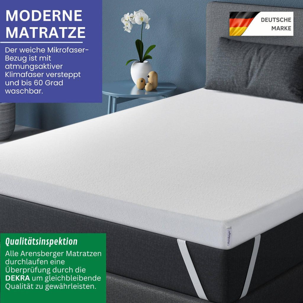 Arensberger Matratzen Topper PREMIUM auf einem Bett im Schlafzimmer