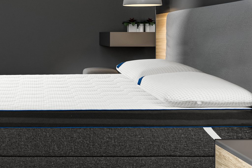eazzzy Topper von Genius auf einem Boxspringbett