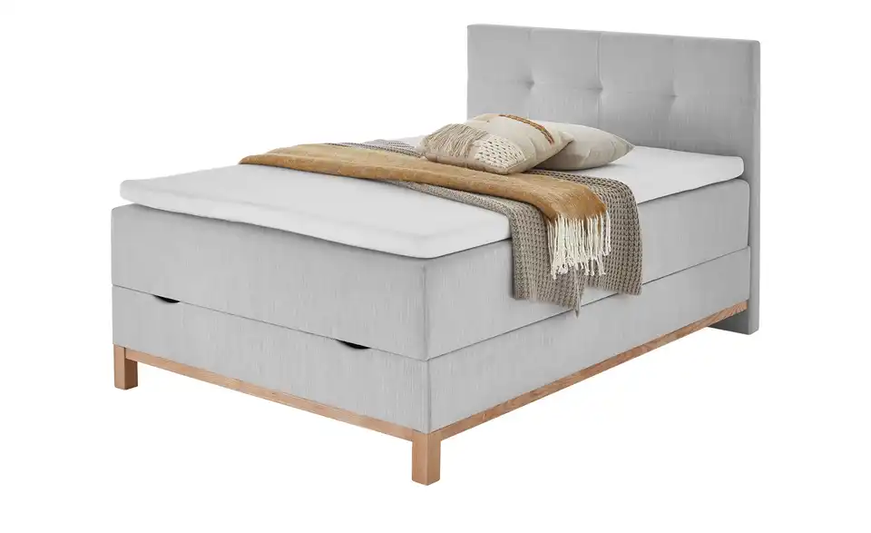 Höffner Home Boxspringbett Catania mit Decke und Kissen auf weißem Hintergrund