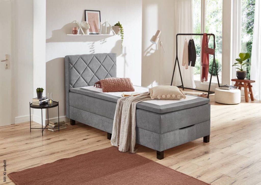 Poco Boxspringbett Jeff mit Kissen und Decke im Zimmer