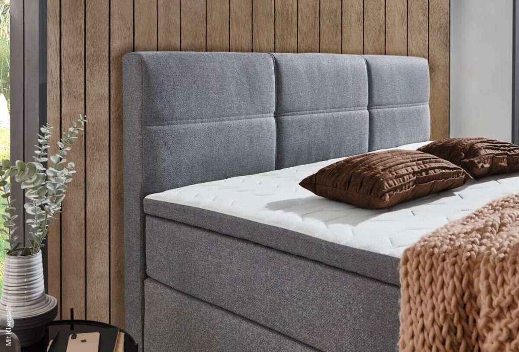 Poco Boxspringbett Kenora – gepolstertes Kopfteil in Grau