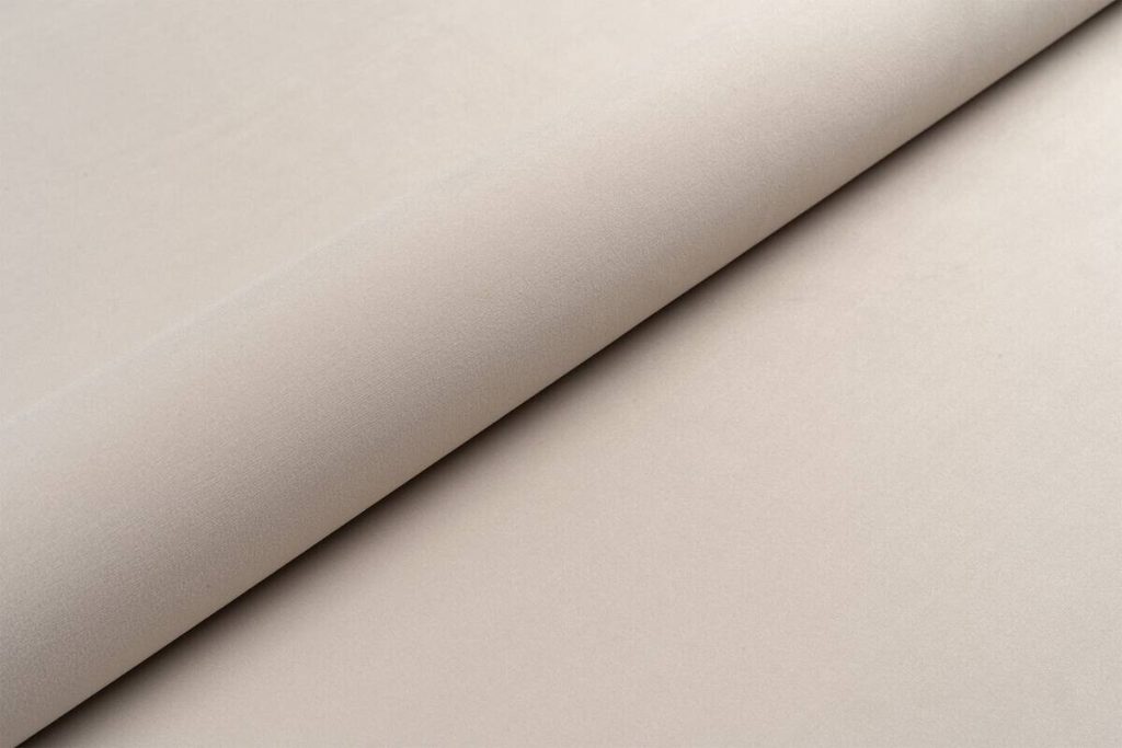 Poco Boxspringbett Lissy – Nahaufnahme des cremefarbenen Bezugsstoffs