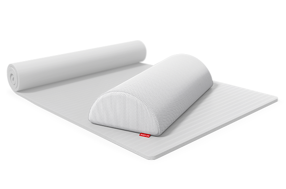 bett1 BODYGUARD Knie- und Nackenrolle auf einer Yogamatte